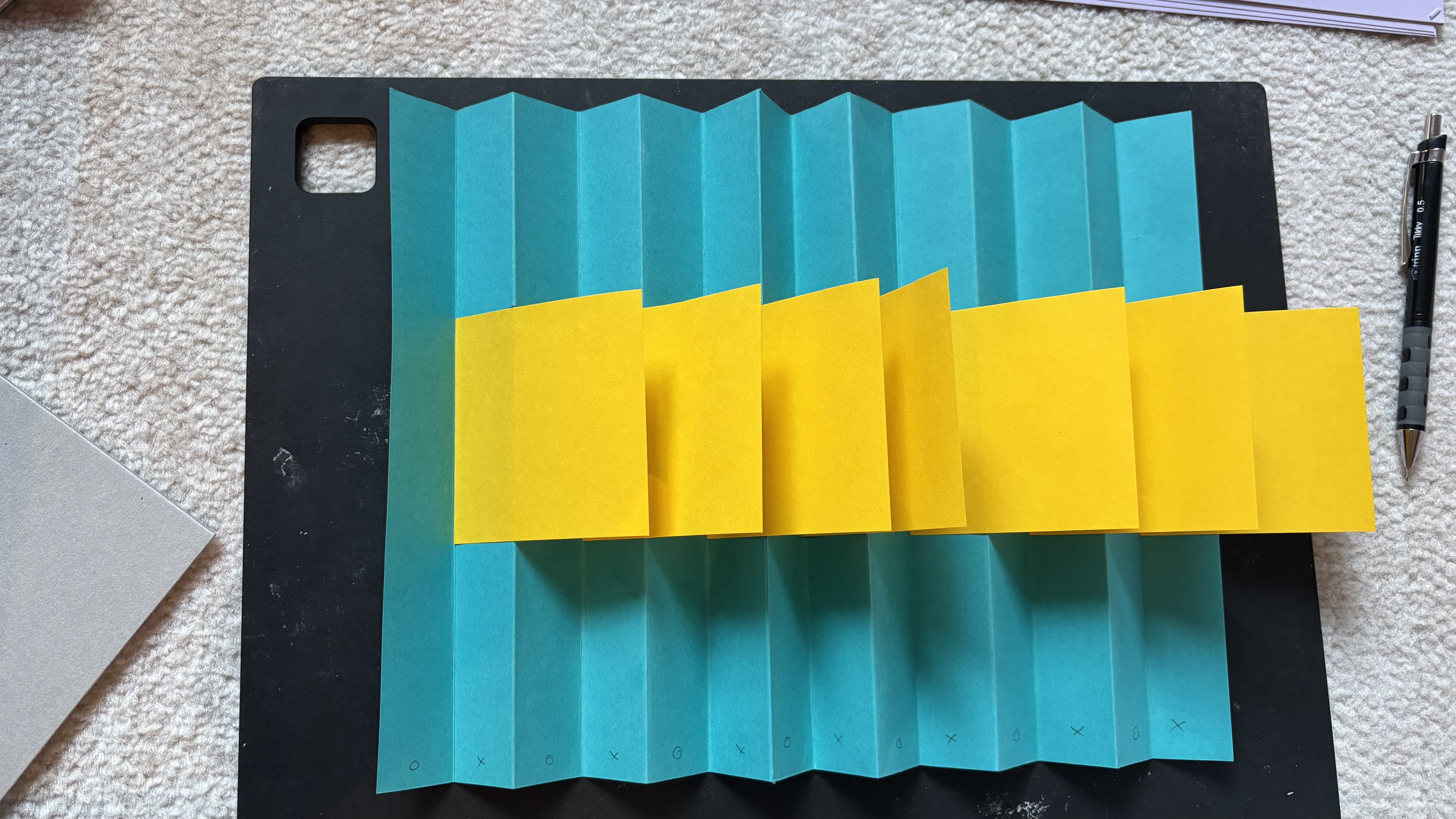 Using two colors of sticky notes to plan flag placement