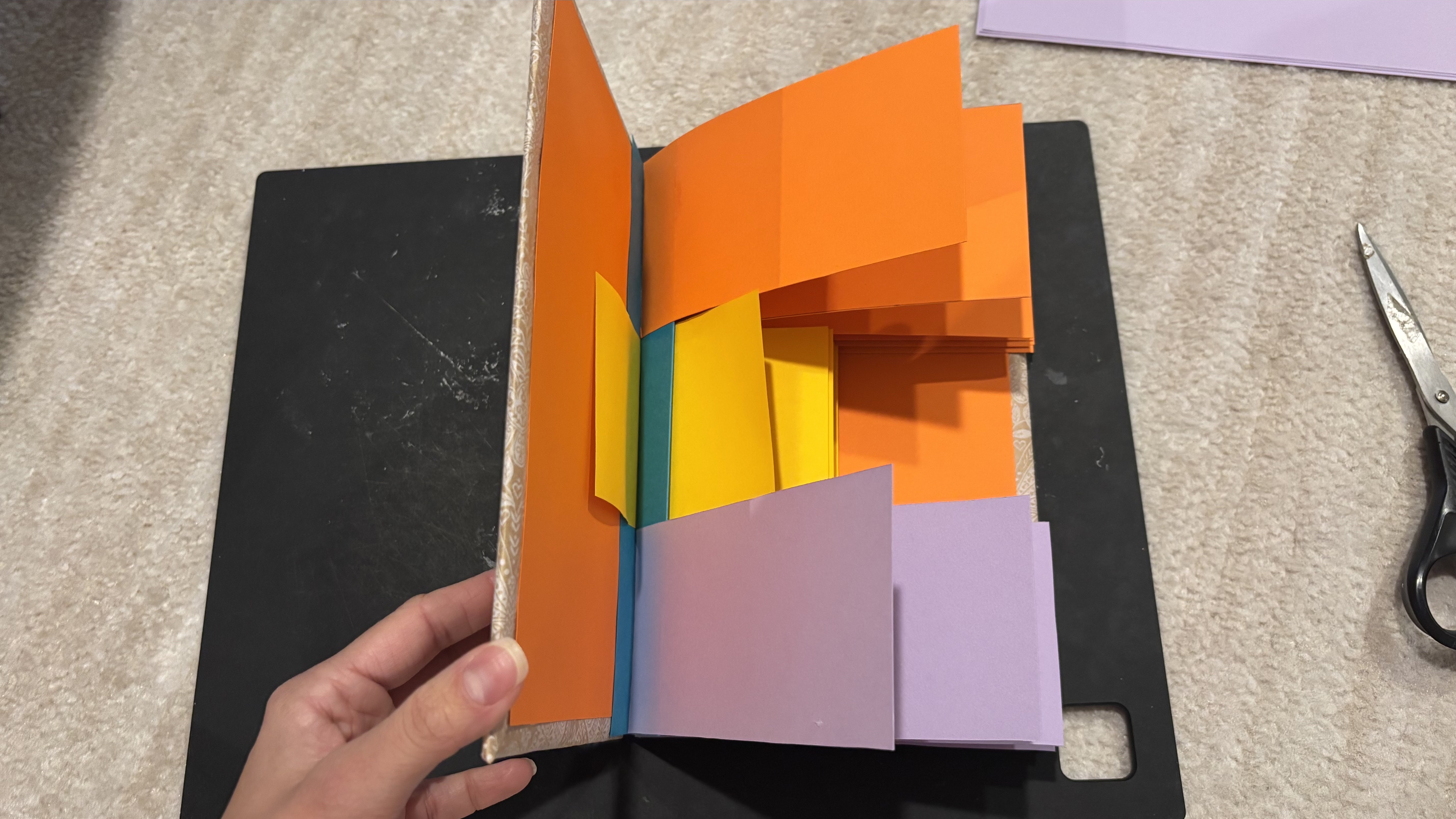 Finished handmade flag book with colorful accordion pages